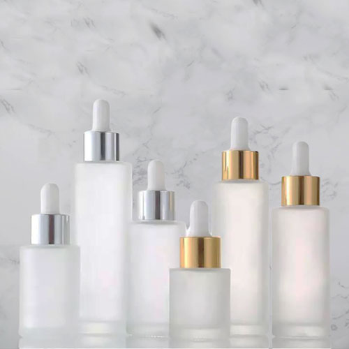 Flat Shoulder Cylinder Glass Bottle Manufacturers in Delhi